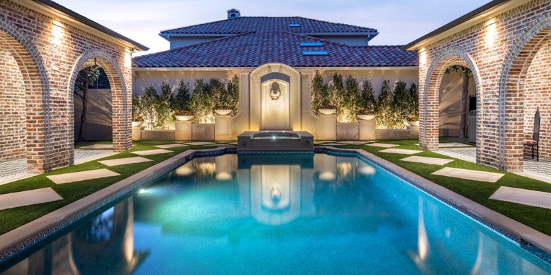 Custom pool built by Hoss Custom Pools - University Park Texas